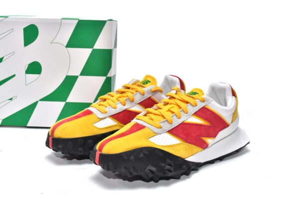 White, yellow, and red executive edition of the New Bailun XC-72 series running shoes