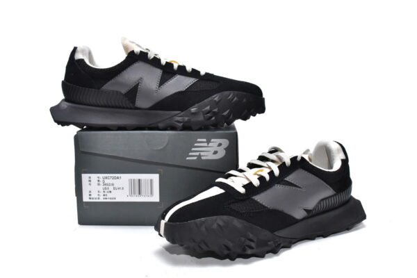 Black executive version of the New Bailun XC-72 series running shoes