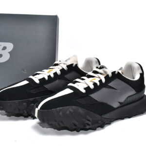 Black executive version of the New Bailun XC-72 series running shoes