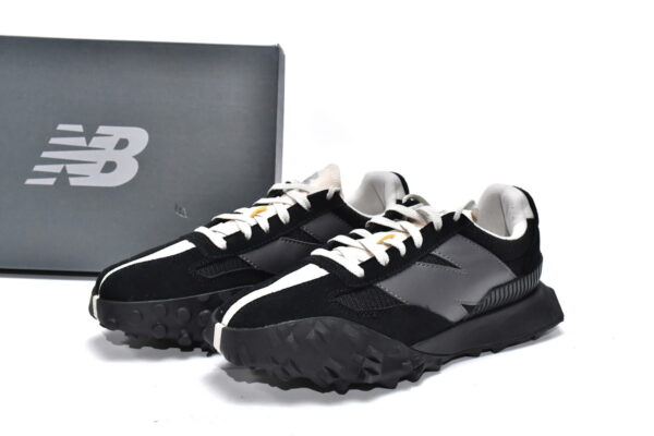 Black executive version of the New Bailun XC-72 series running shoes